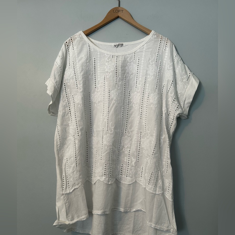 Ladies white top. New with tags. Purchased from a boutique